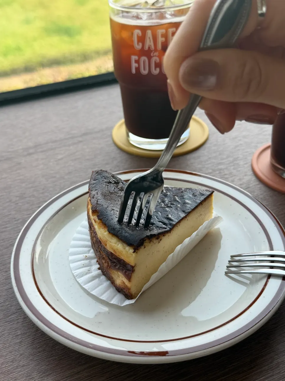 A slice of vanilla bean Basque cheesecake