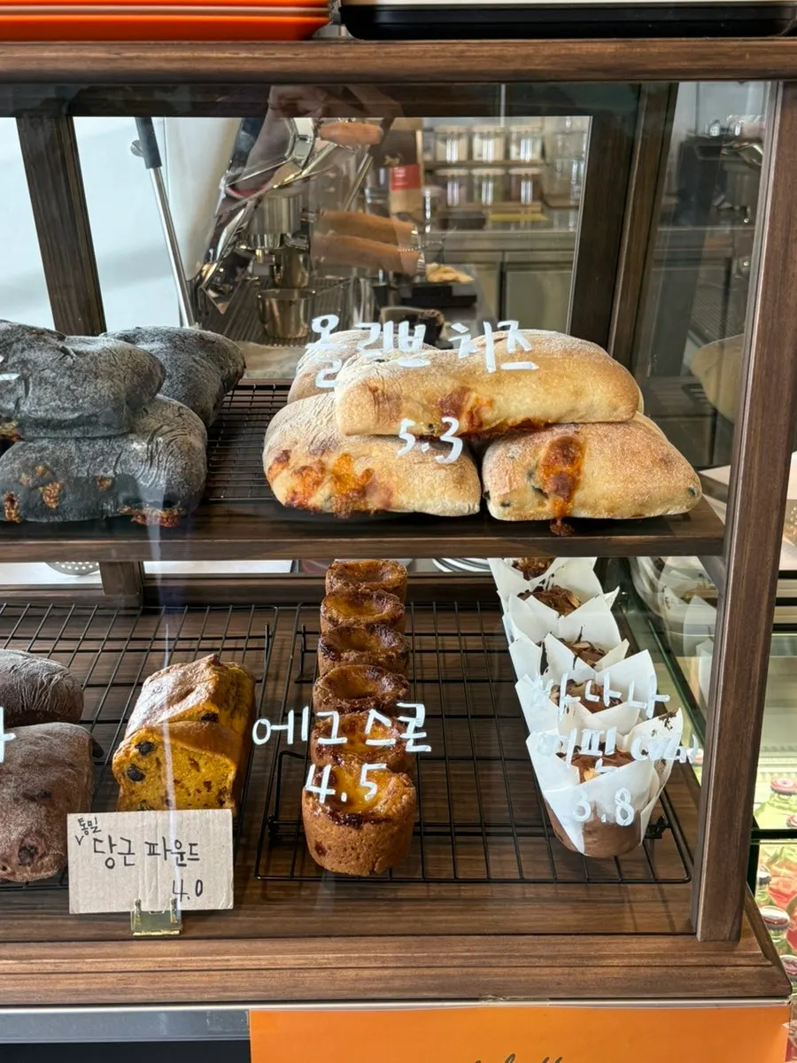 Various sourdough ciabattas laid out with price tags