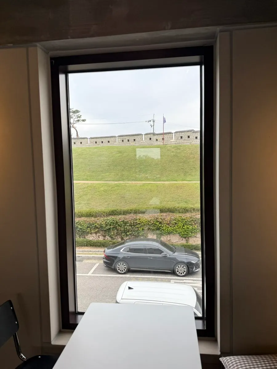 2nd-floor seating at Caffeine Focus with a view through the window