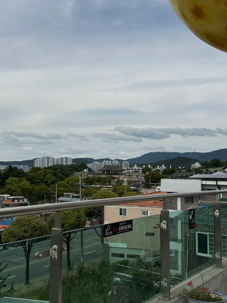 3rd-floor window seat with fortress view at Caffeine Focus