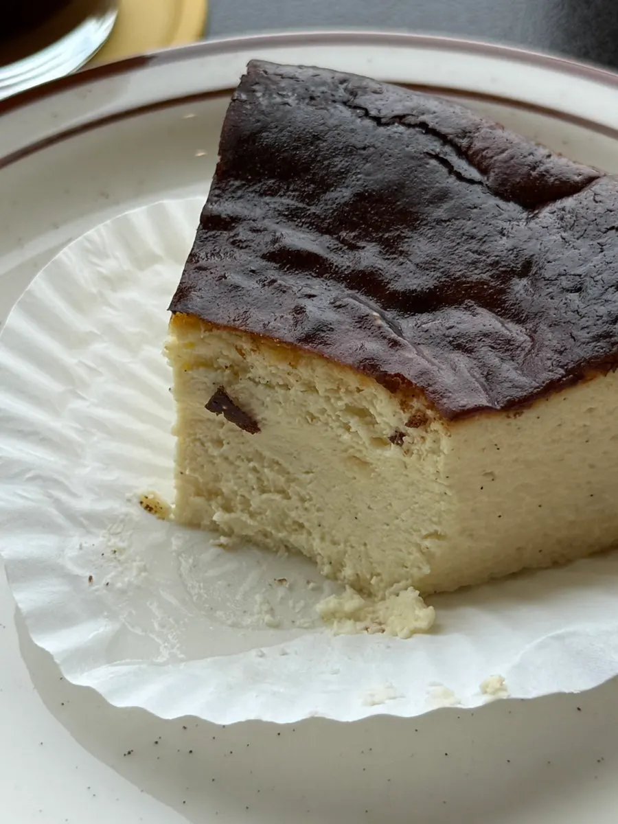 Inside of the Basque cheesecake showing visible vanilla bean specks