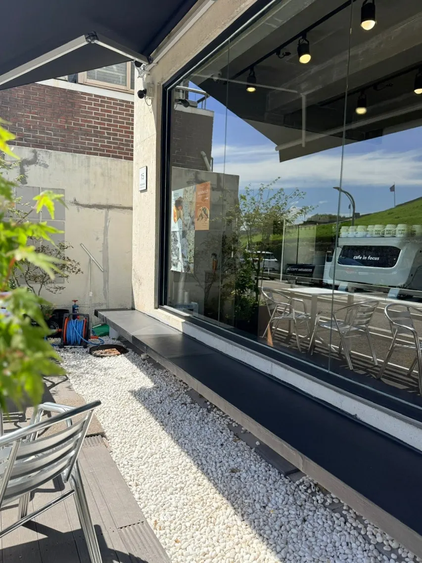 Seating in the 1st-floor terrace zone at Caffeine Focus
