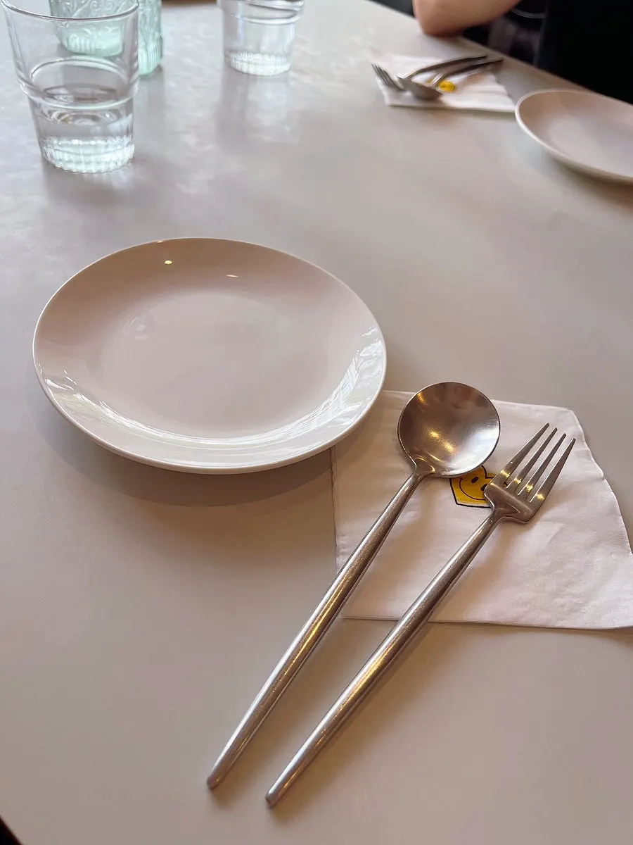 Table set with cutlery and dishware