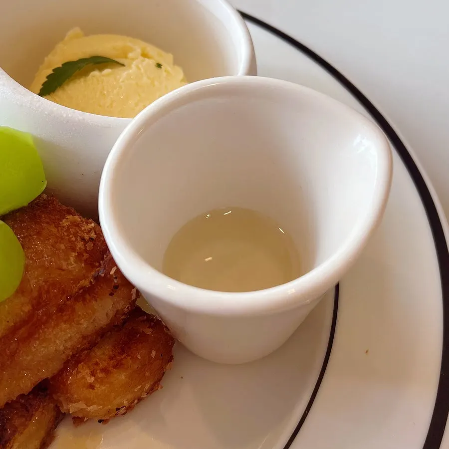 French toast topped with vanilla ice cream