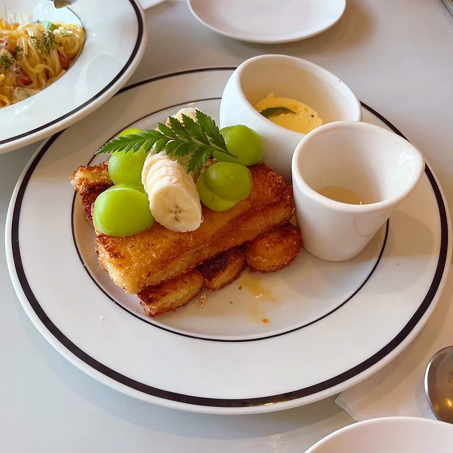 French toast plate with green grapes and banana