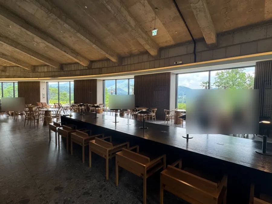 MUG's interior with high ceilings and large windows