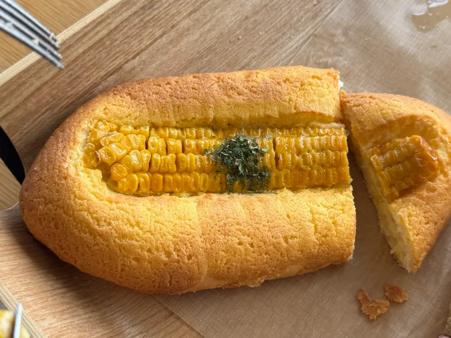 Real corn bread with a whole corn cob embedded