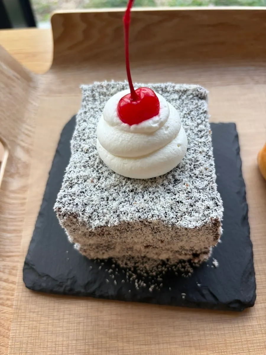 A cake with chocolate and cherry aroma