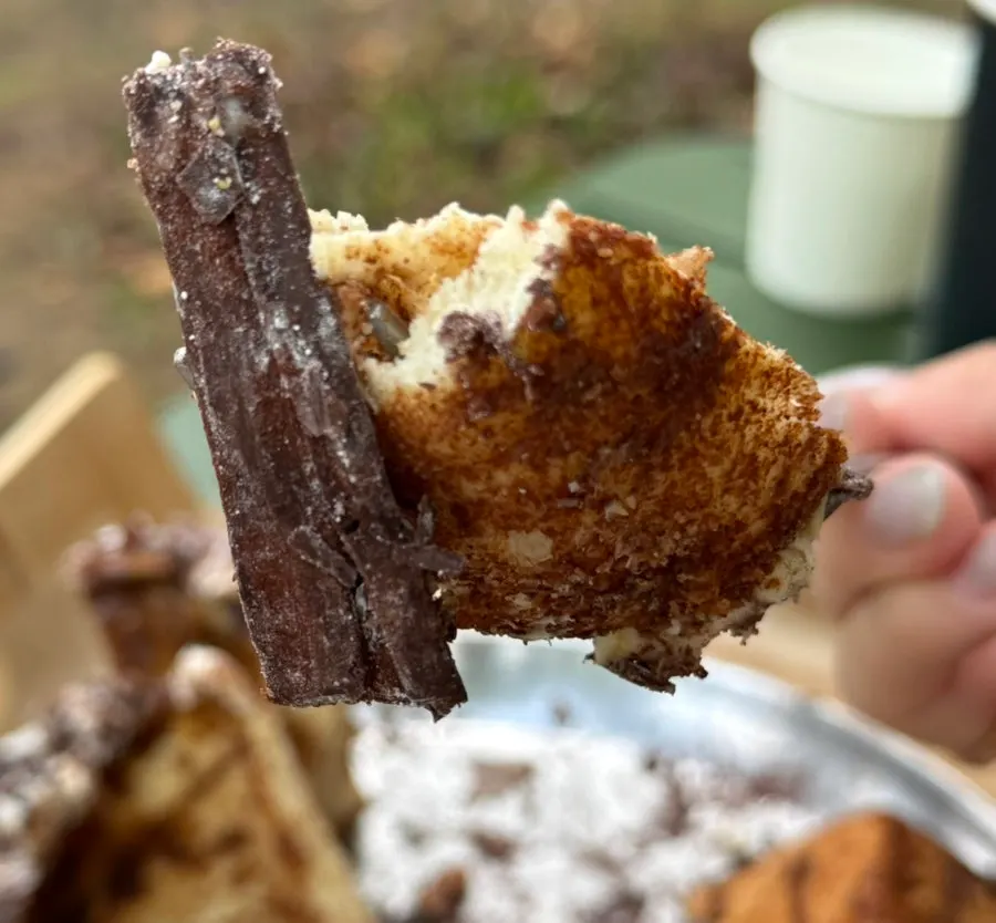 Cross-section of the tiramisu cinnamon roll pulled apart in layers