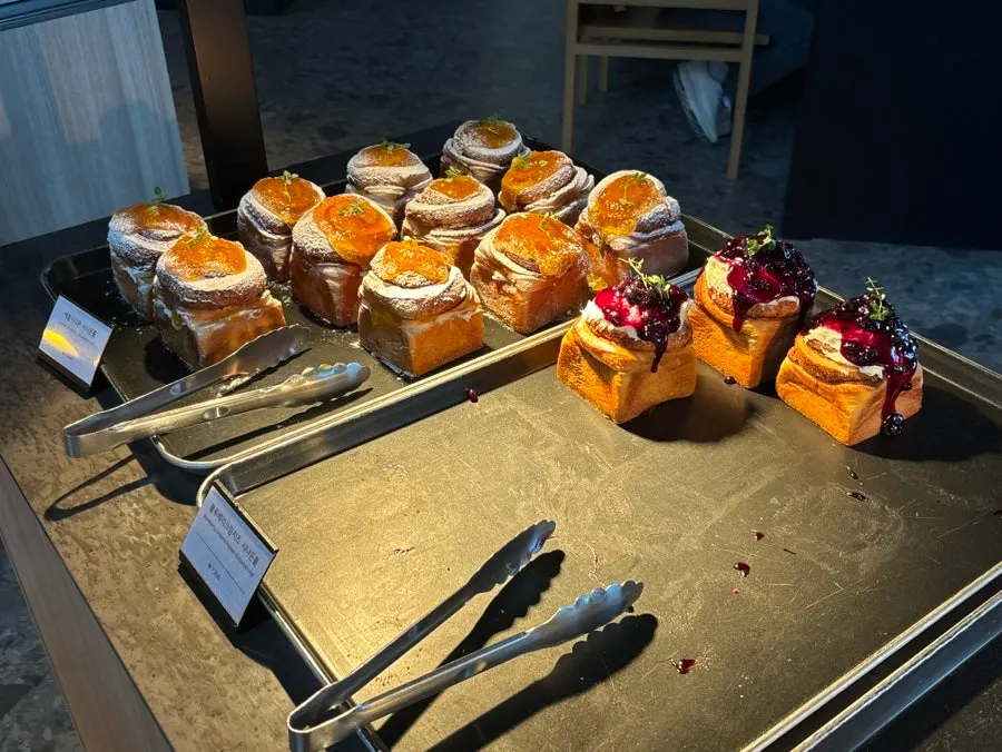 Bakery counter with various breads at MUG