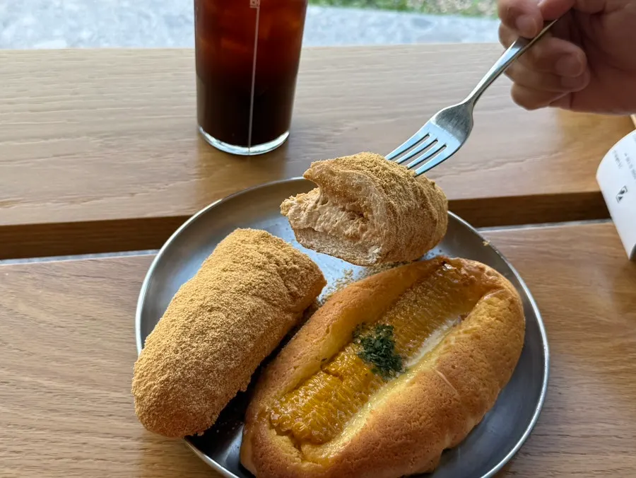 Cross-section of injeolmi bread filled with cream