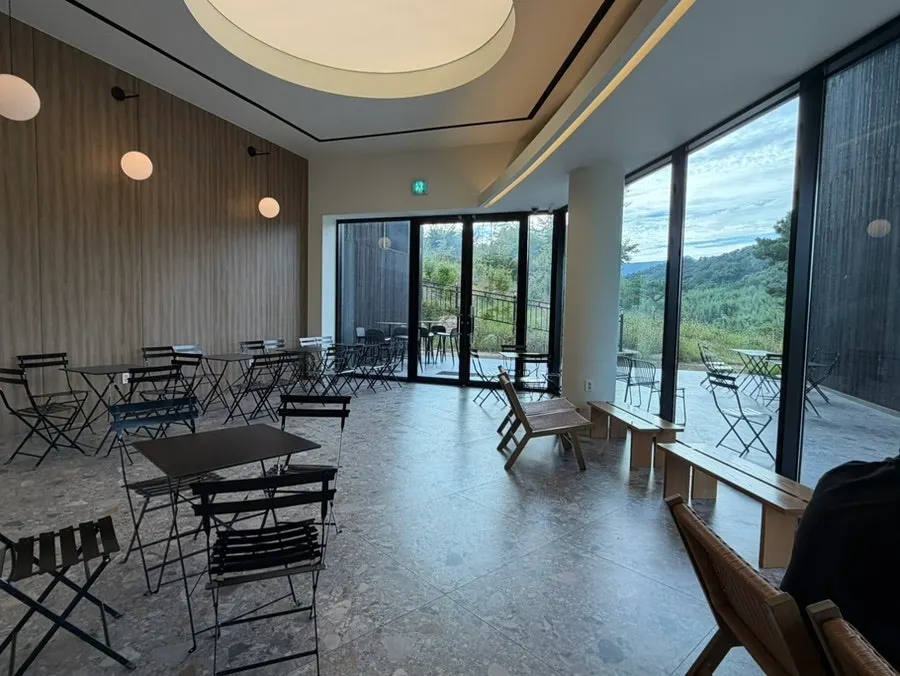 Window-side seat at MUG with a view of the outdoor scenery
