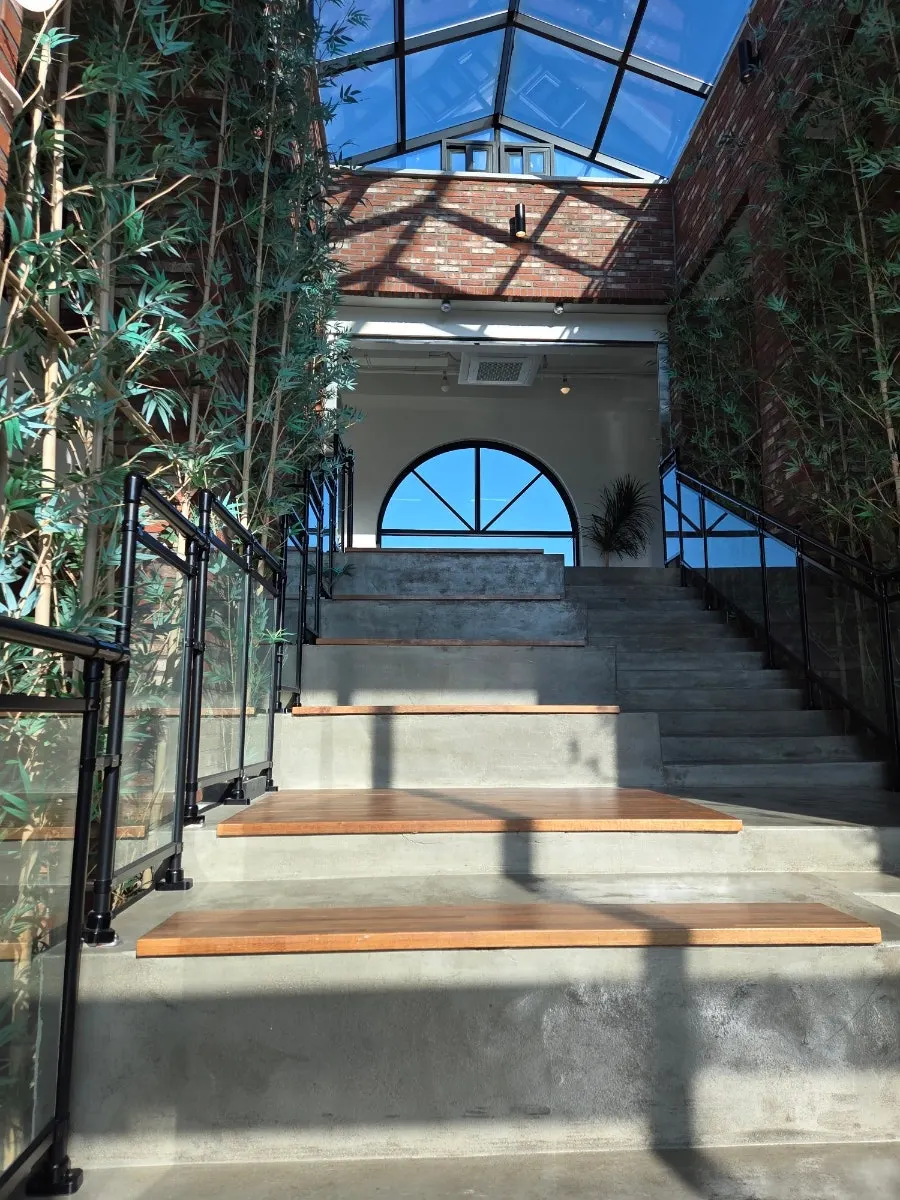 Distinctively decorated staircase leading to Cafe Neorae's 3rd floor