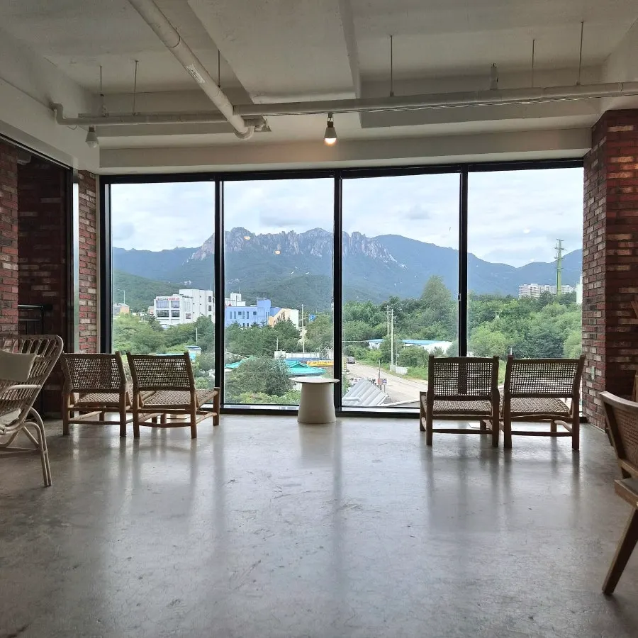 Seating with a forest view at Cafe Neorae