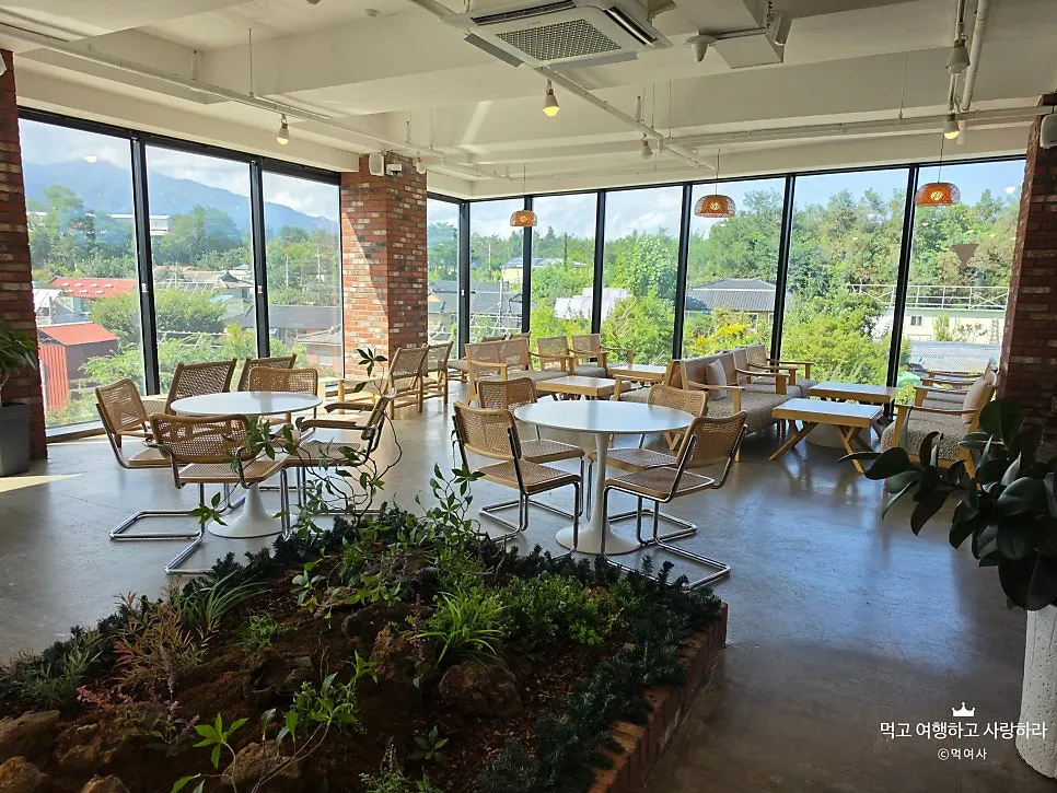 Sunlit interior on the 3rd floor of Cafe Neorae