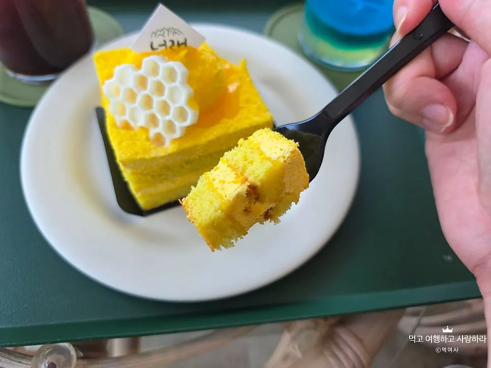 Cross-section of a sliced sweet corn cream cake