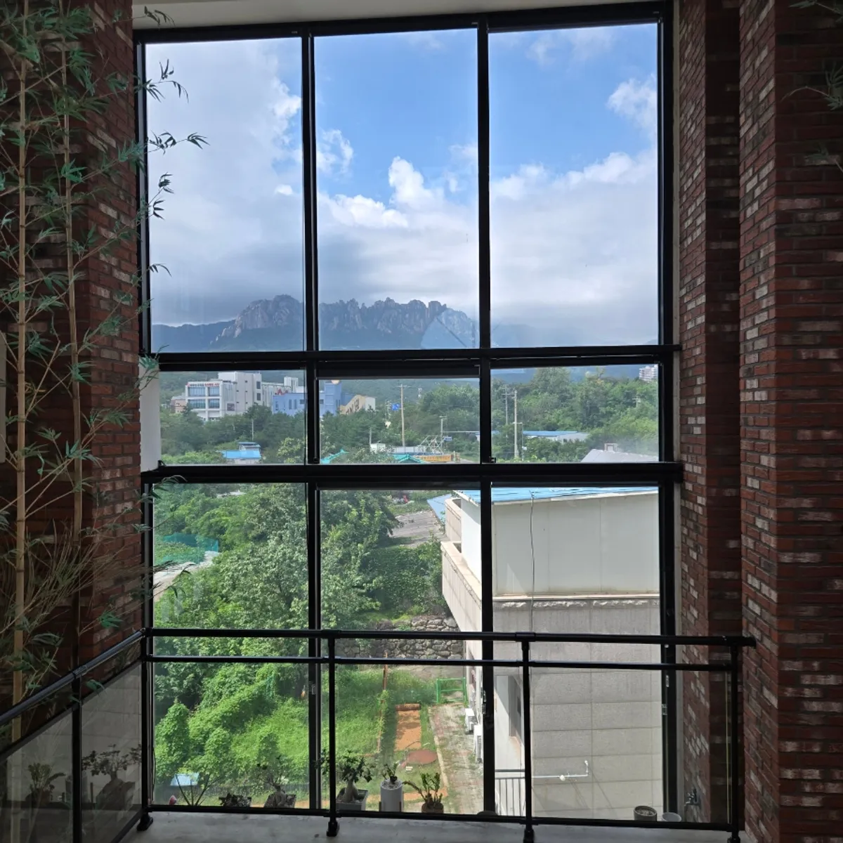 Ulsanbawi Rock framed like a painting through the floor-to-ceiling window