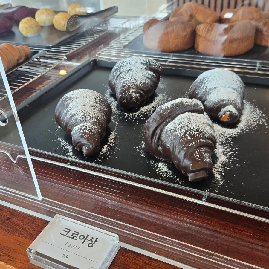 Assorted baked goods on display at Cafe Neorae