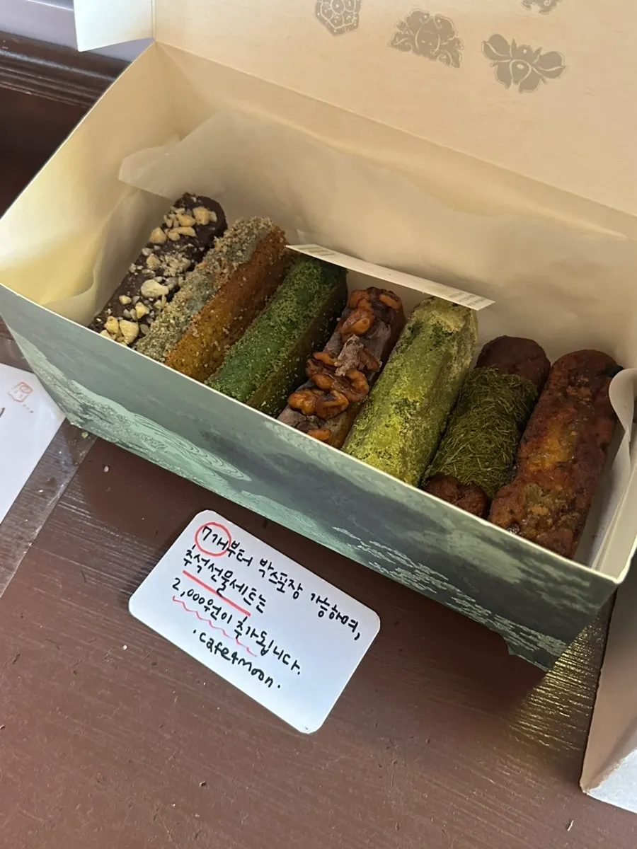 Display case with various types of madeleines
