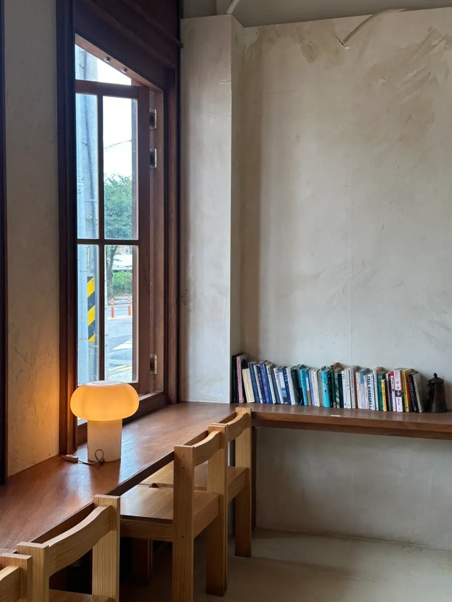 Bright wood-toned furniture inside the annex