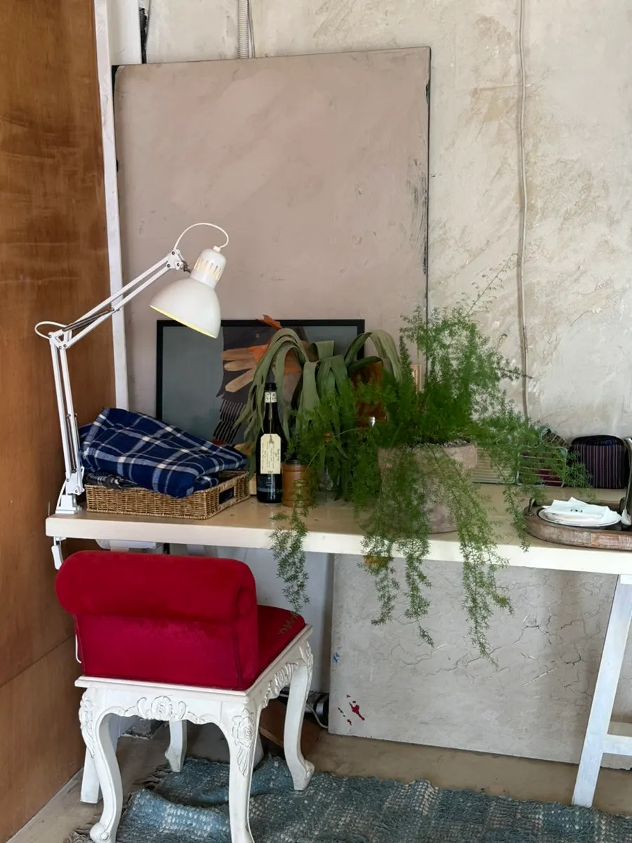 Wooden chair seating by the window in the annex