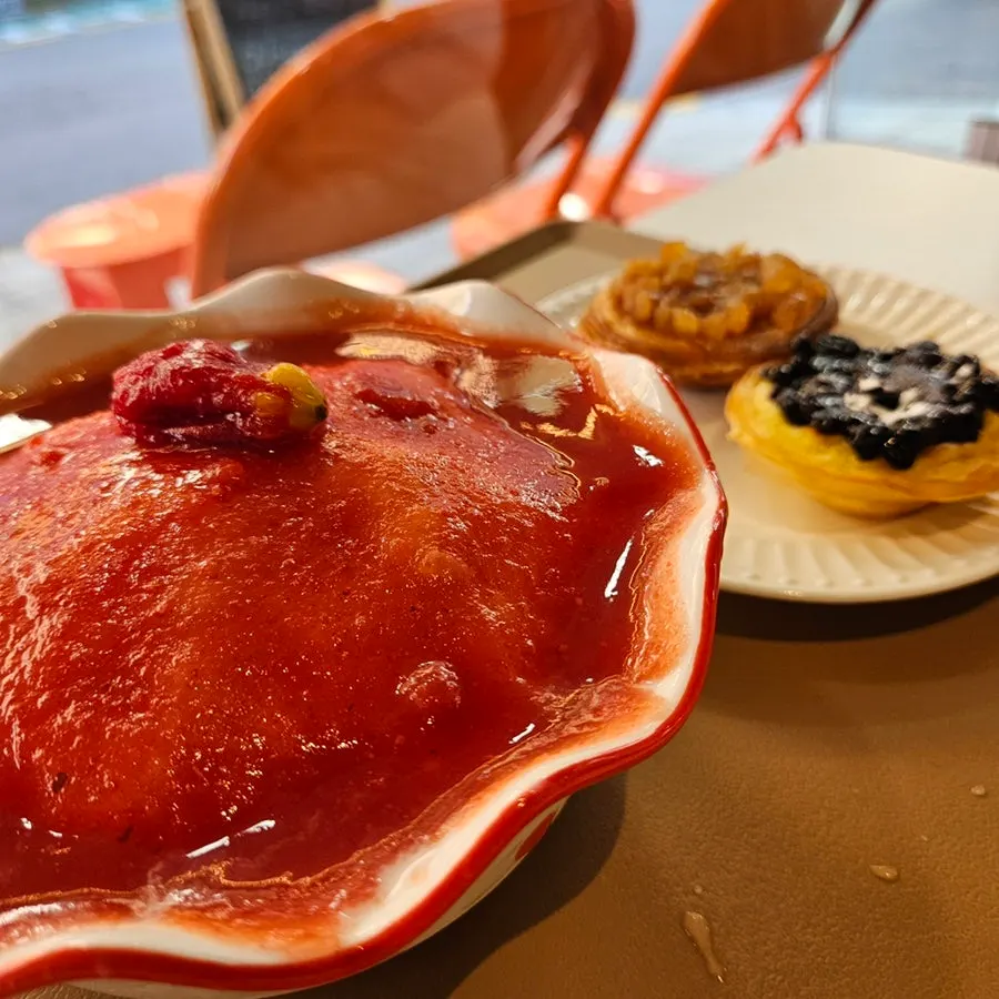Dried tomato flesh inside milk shaved ice