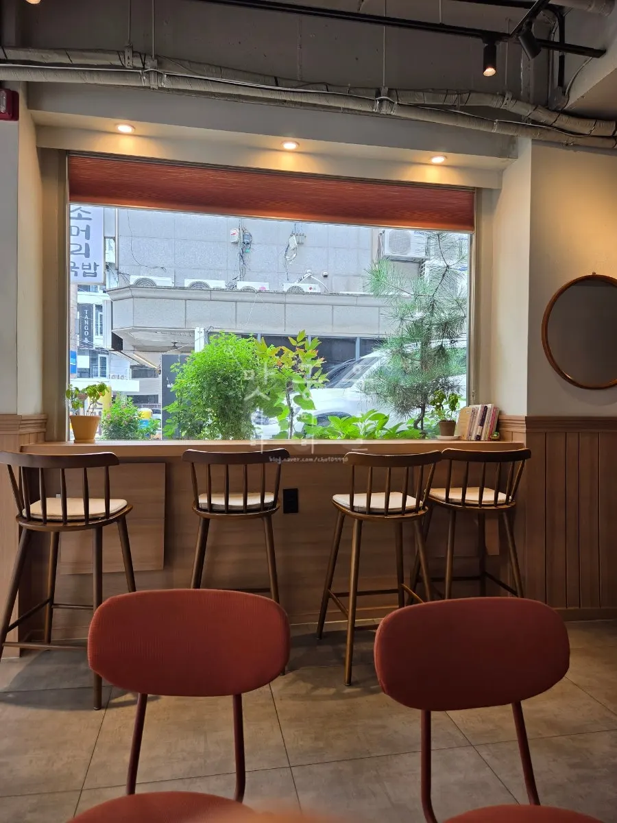 Interior view of Cafe Ssum with its large window