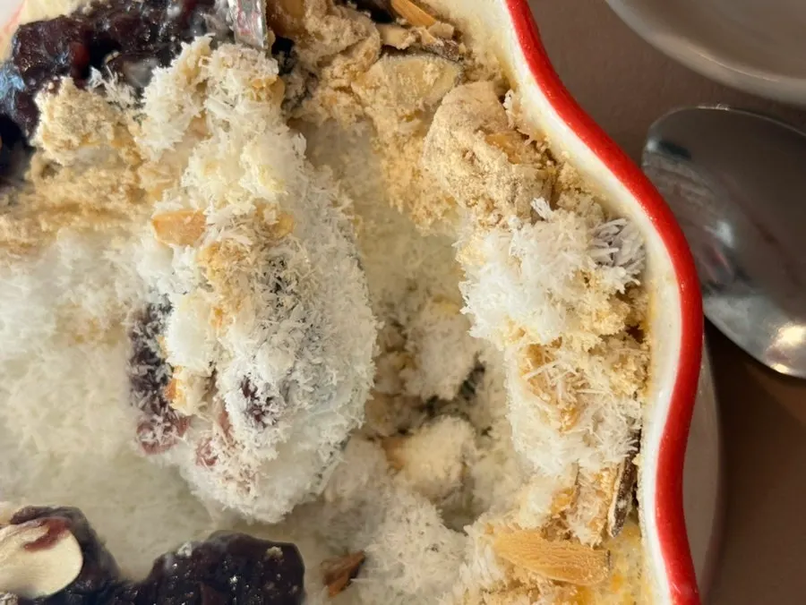 Scoop of bean-powder-topped snow ice bingsu