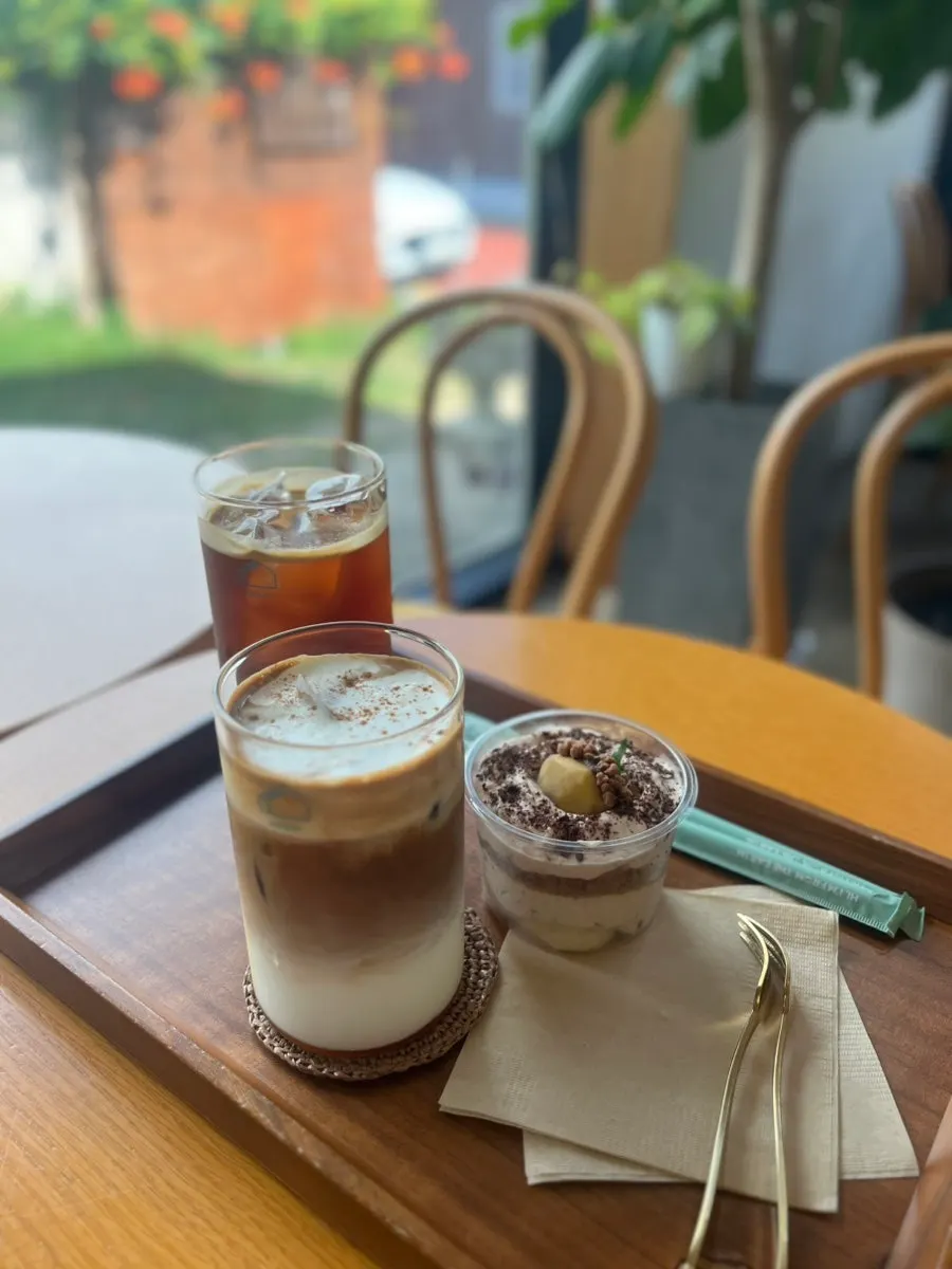 Drinks and chestnut tiramisu set on the table