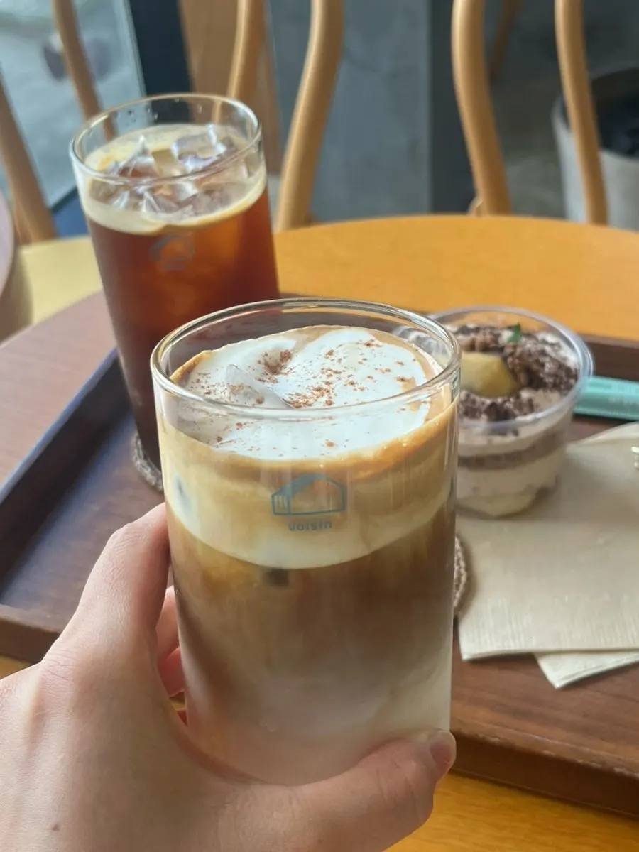 Maple cream latte topped with thick cream