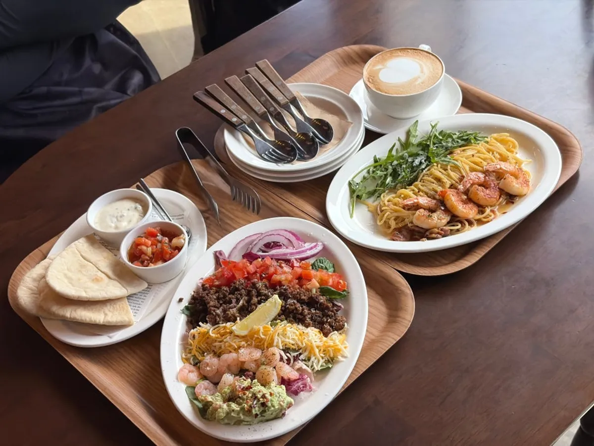 Anchovy bacon pasta and Mexican taco salad served together
