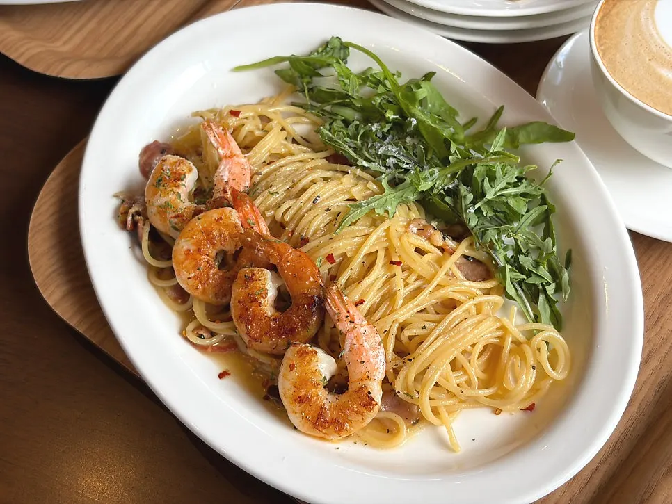 A plate of anchovy bacon pasta