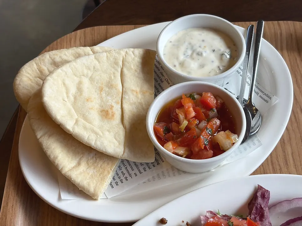 Pita bread served alongside the taco salad