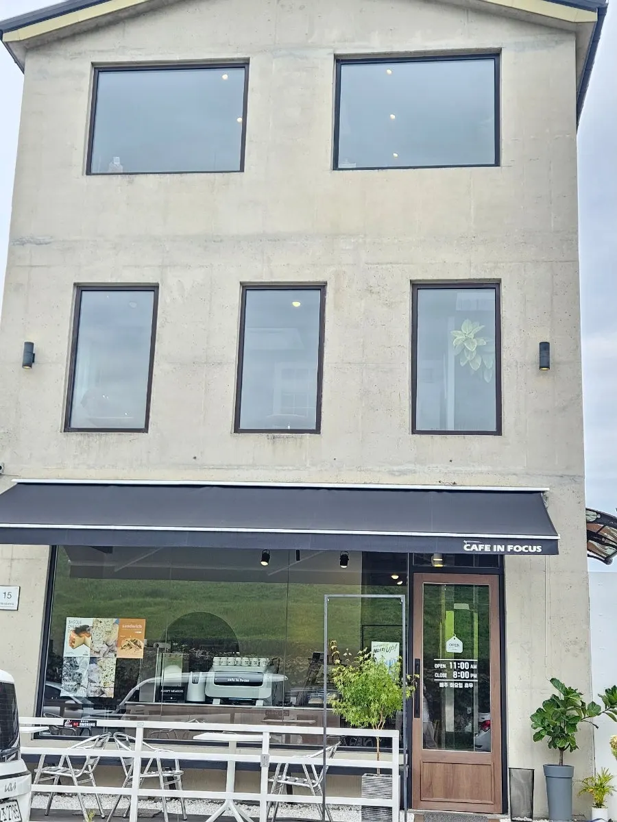 Window seat at Caffeine Focus with the fortress wall visible outside