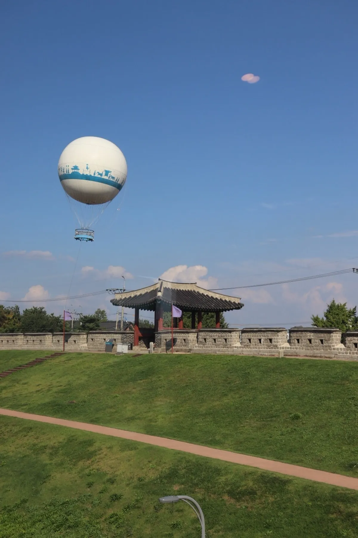 Cover photo of Caffeine Focus, a fortress-wall view café