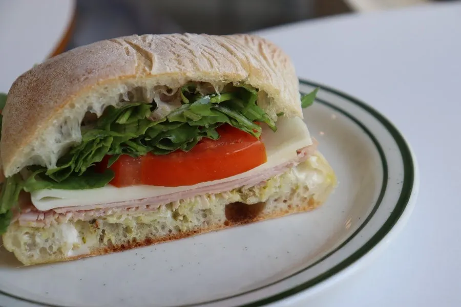 Cross-section of the jambon ciabatta sandwich cut in half