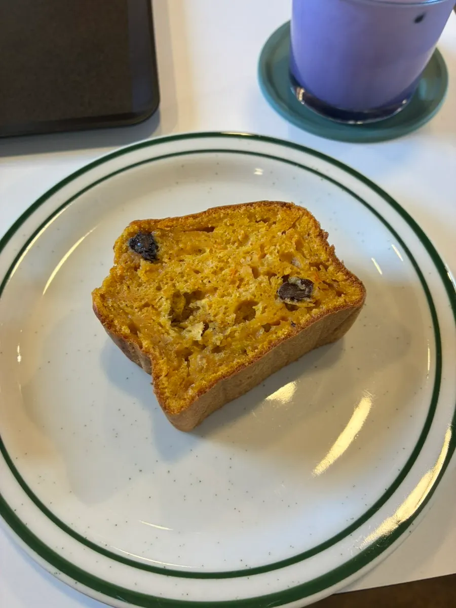 Carrot pound cake topped with cream cheese frosting