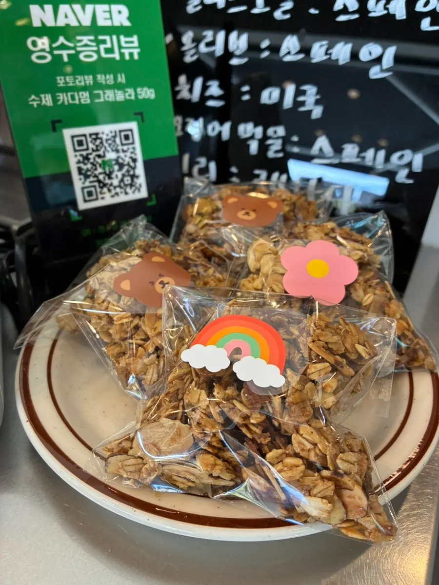 Sign explaining the granola perk at Caffeine Focus