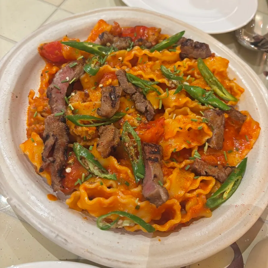 A plate of Camel Orzo's galbi & cheongyang bolognese