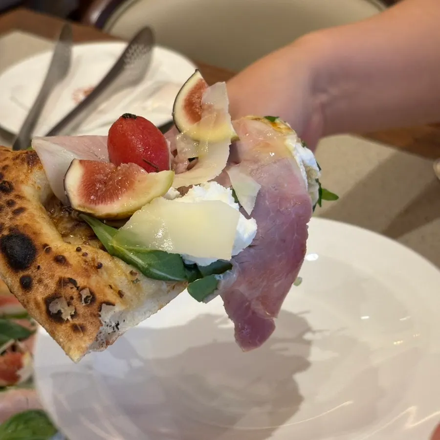 Close-up of a slice of the fig pizza