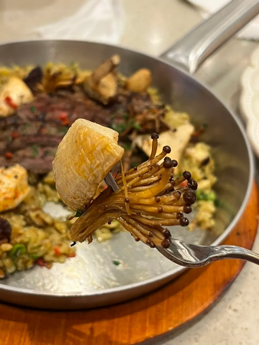 Paella rice tinted yellow from saffron