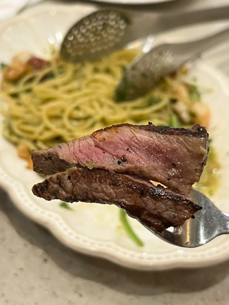 Sliced aged hanwoo steak served on top