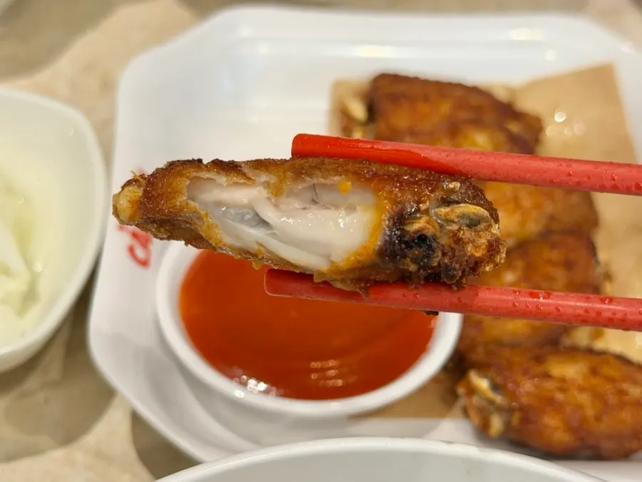 Six pieces of crispy fried chicken wings at Kkamon