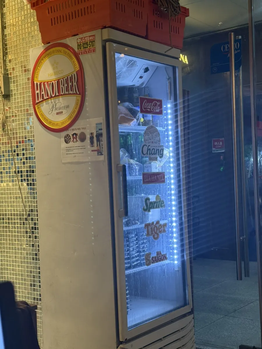 Fridge stocked with beer at Kkamon