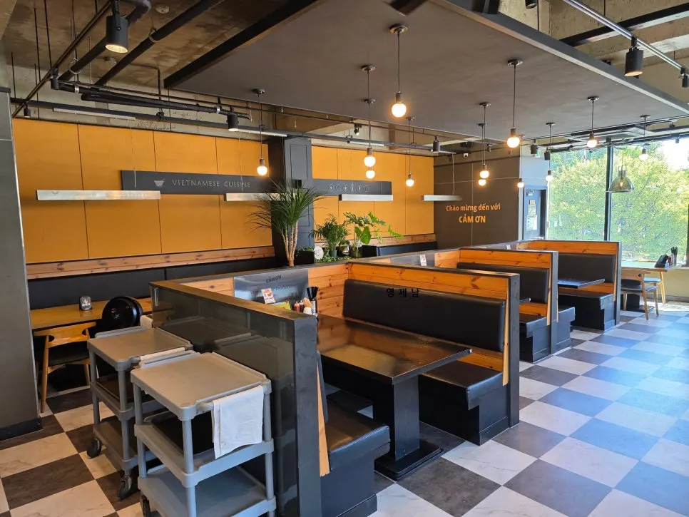 Metal pendant lighting and exposed concrete ceiling