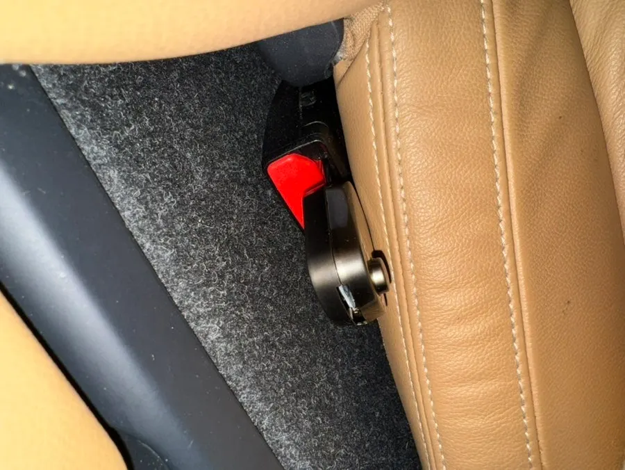 Extension clip connected to a car seat belt