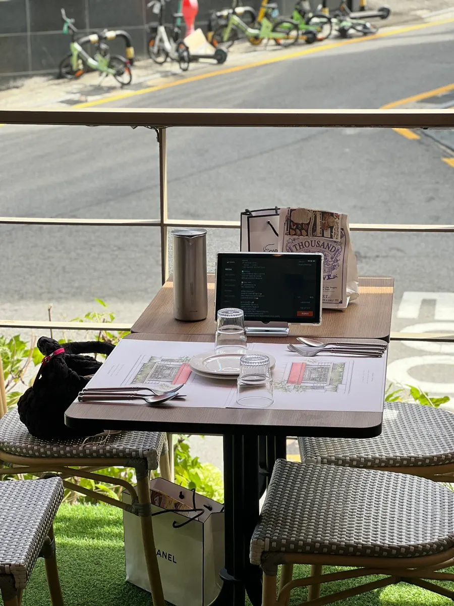 Terrace-view seats by the window at Casamil