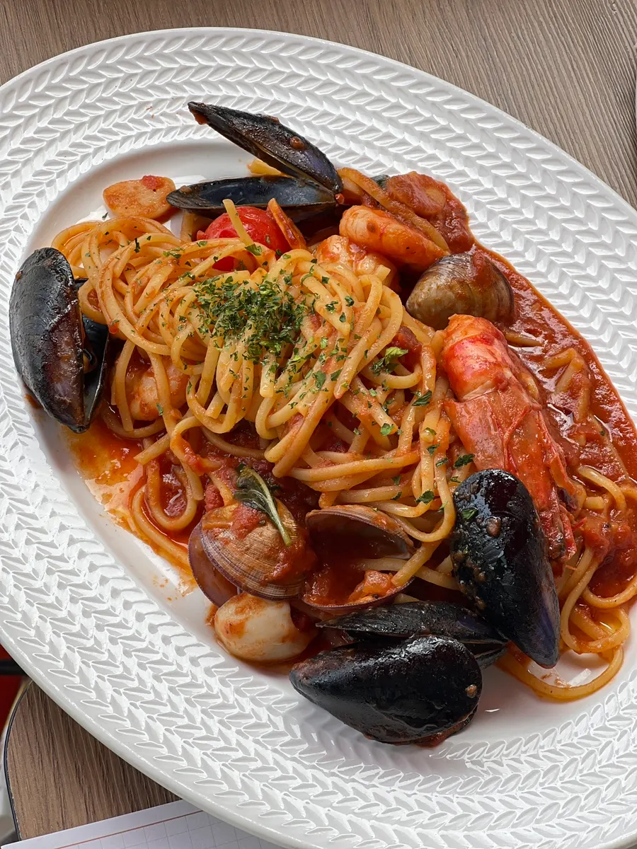 Seafood tomato pasta with baby octopus and shrimp