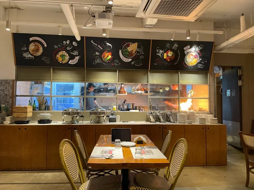 Open kitchen where you can see the chef cooking