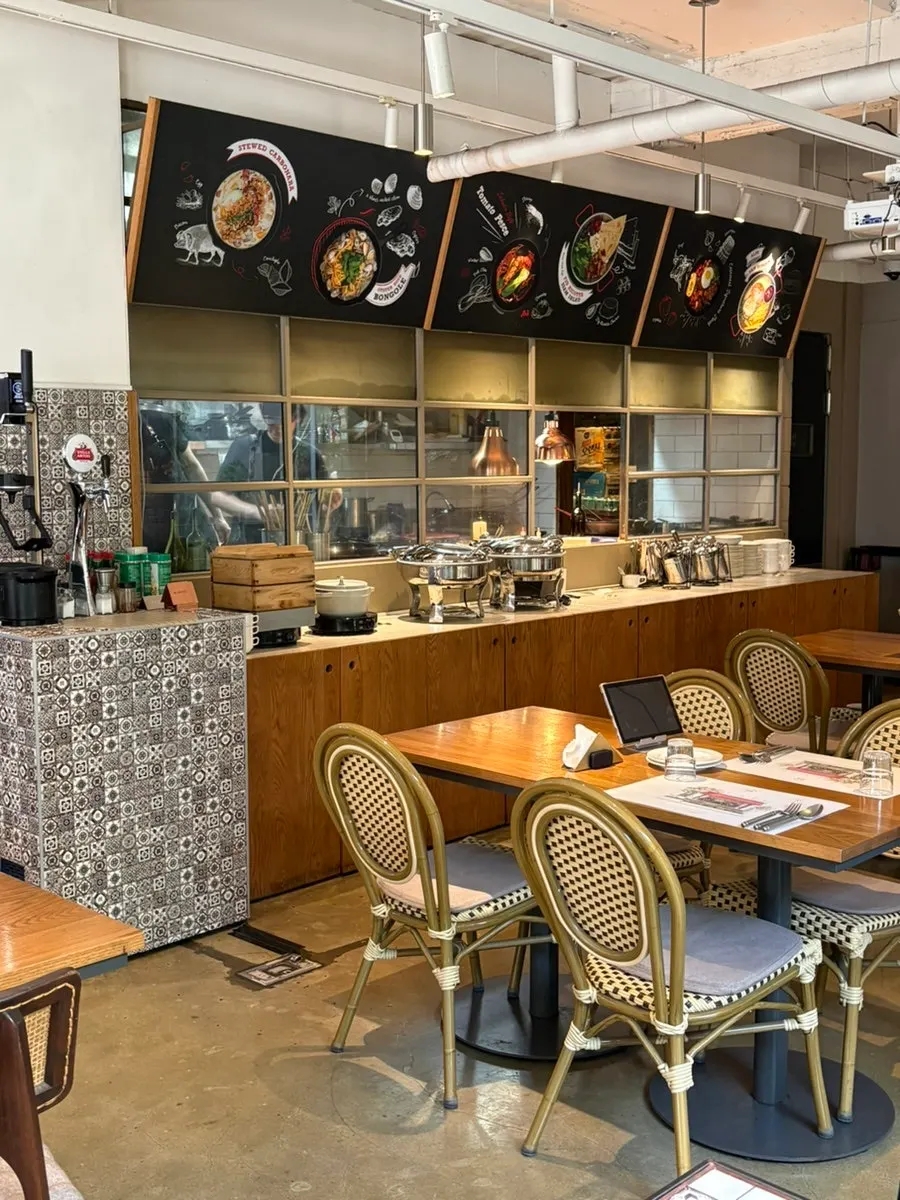 Casamil interior with patterned tile tables